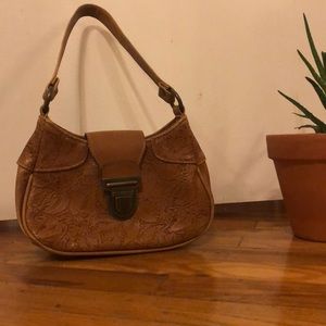 Adorable mini purse with embossed floral detailing